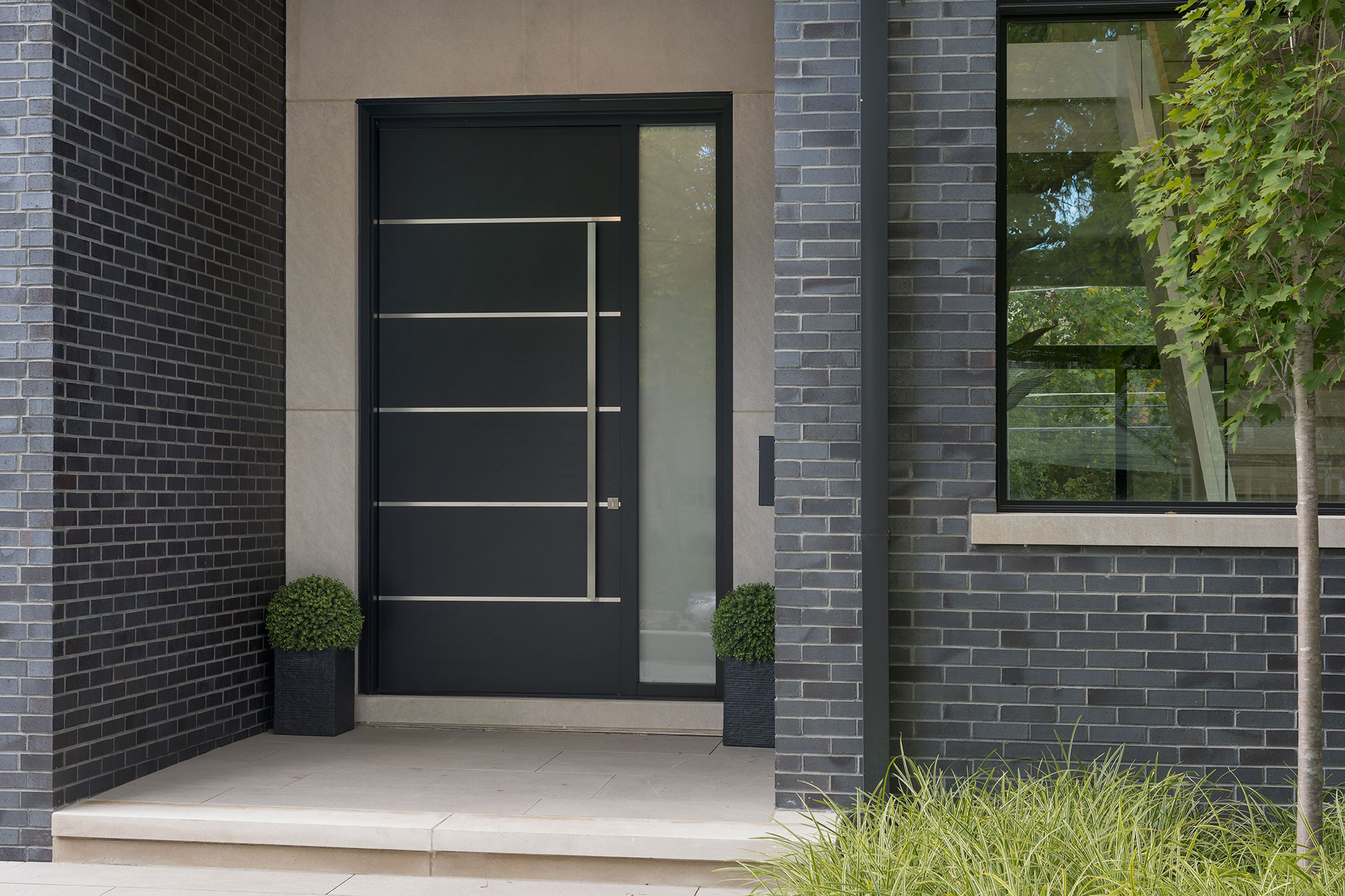 Close-up of Cast Aluminum Door Detailing Textured Surface and Decorative Accents.