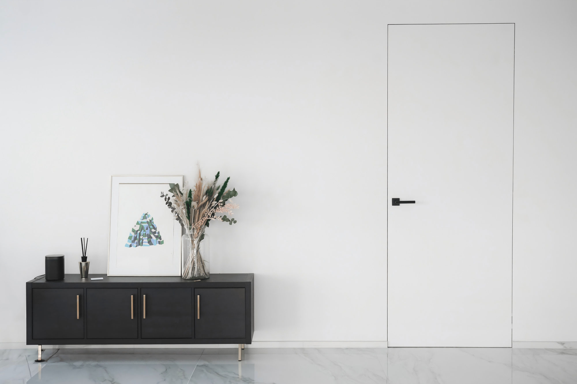 Luxury apartment hallway featuring flush-mounted wood Invisible Door design.