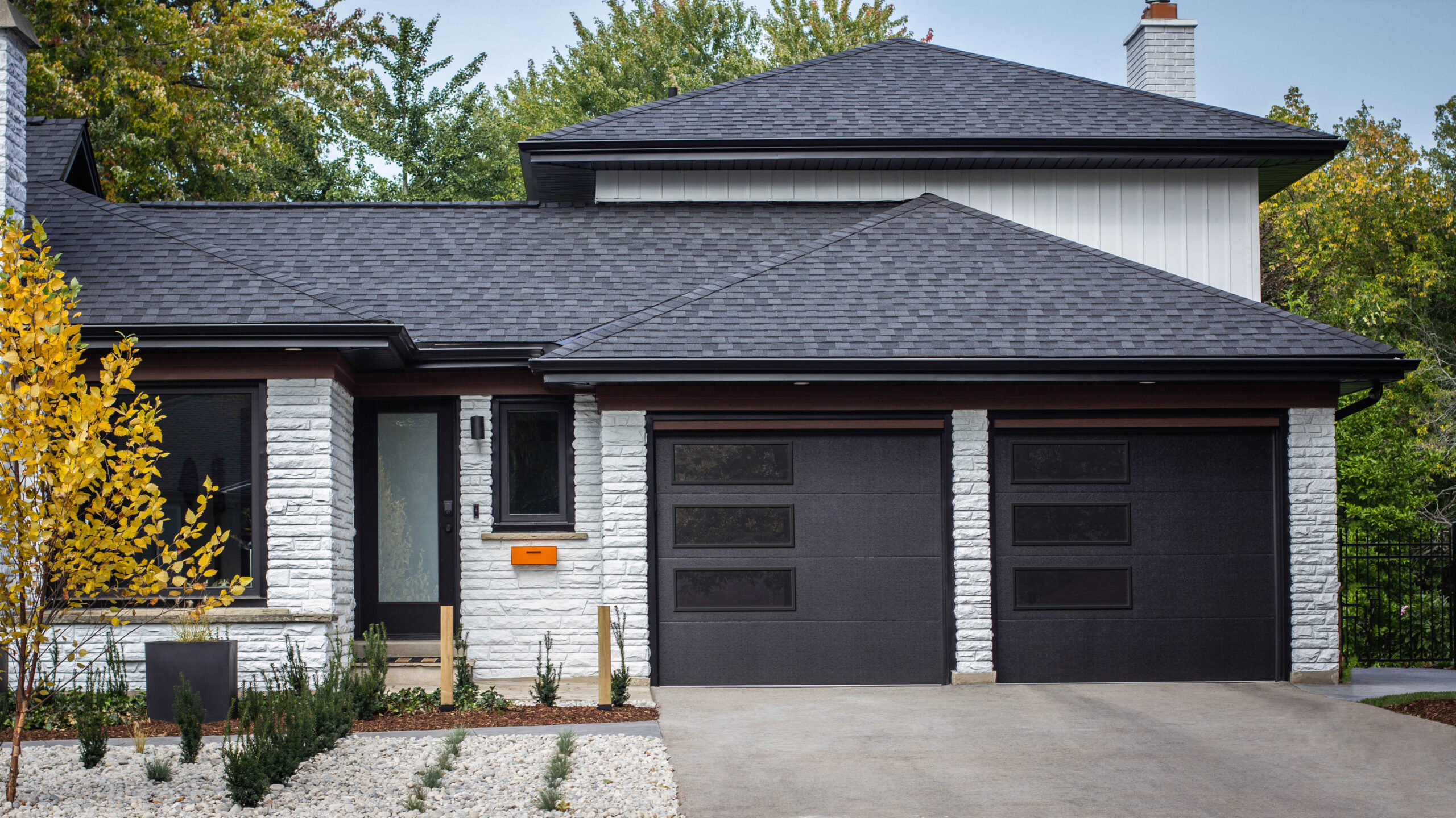 Modern garage door design with sleek panels for residential homes.