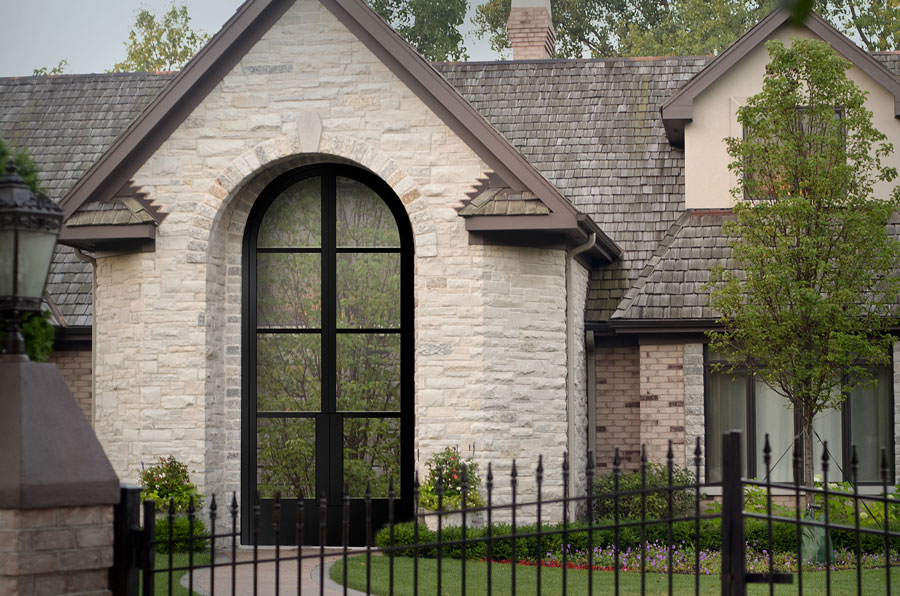 Elegant arched door with classic architectural design.