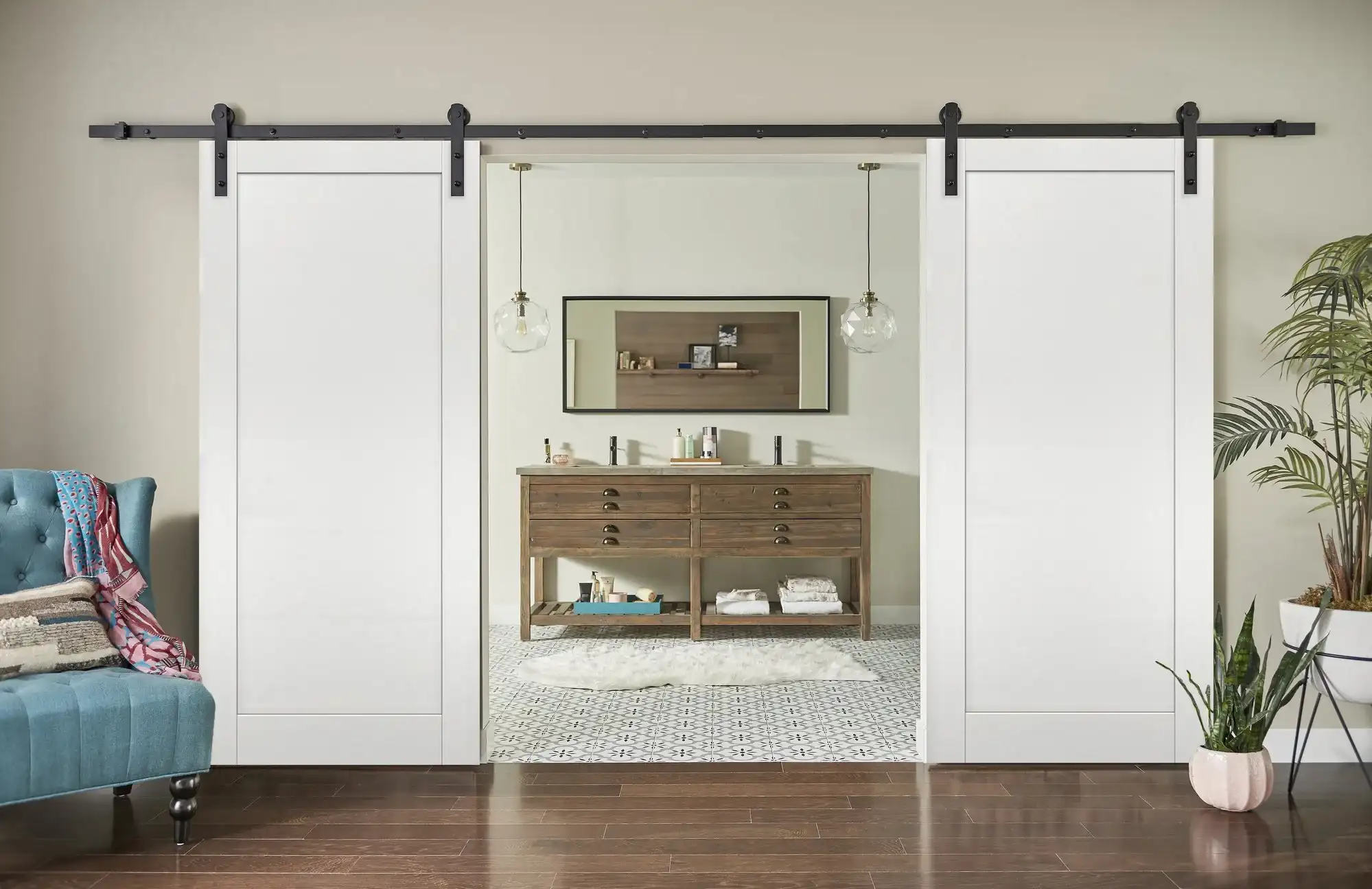 Classic reclaimed wood barn door installed in a cozy farmhouse kitchen.